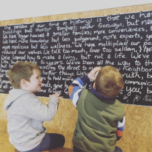 boys by a blackboard