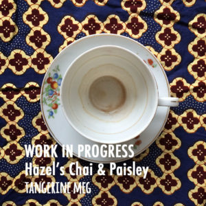 Photograph with a top view of a white china cup and saucer with tree design, with marks showing the gradual drainage of the cup. The background is a blue, cream and deep red/brown patterned fabris. The blog post text is overlaid in white.